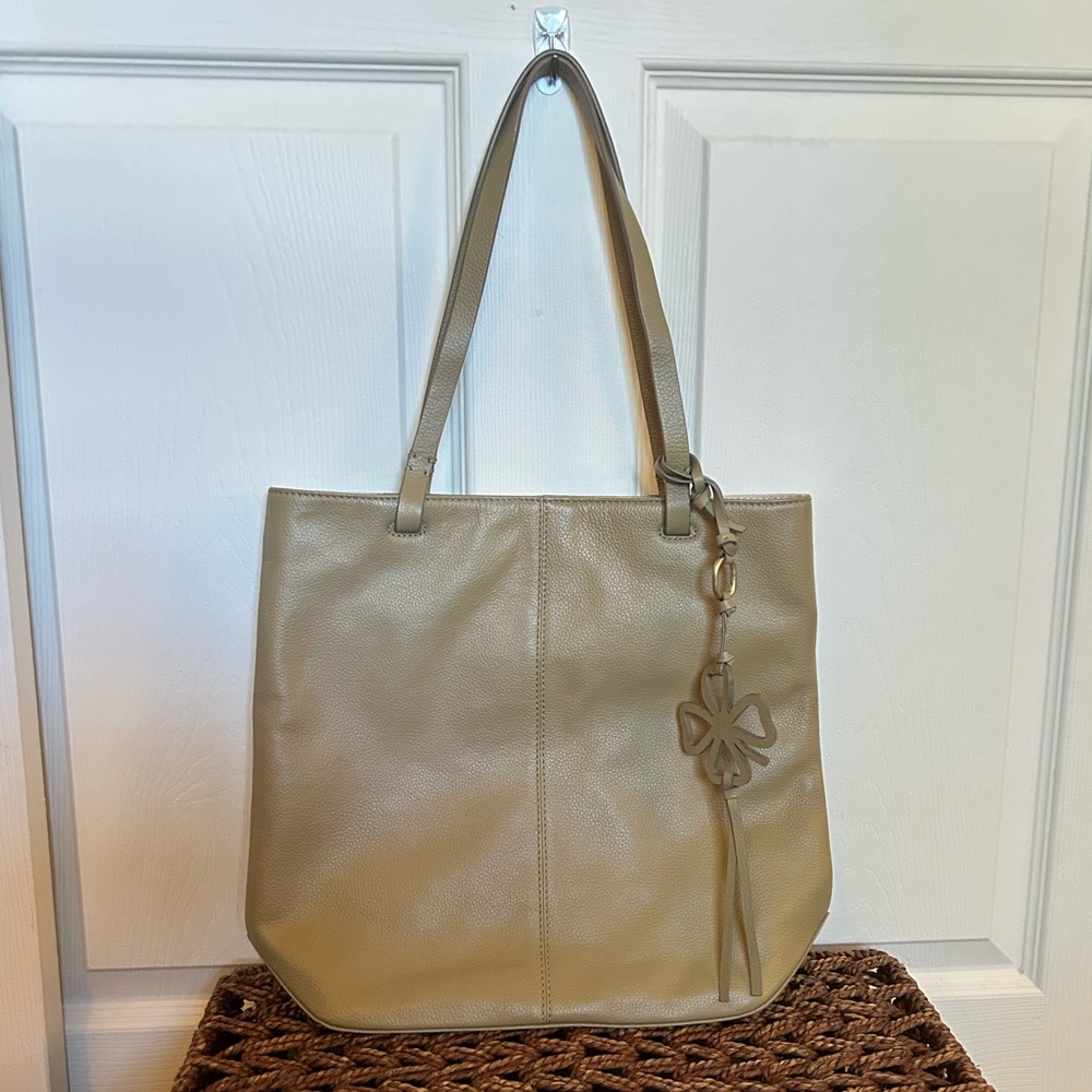Lucky Brand green leather tote with clover purse charm